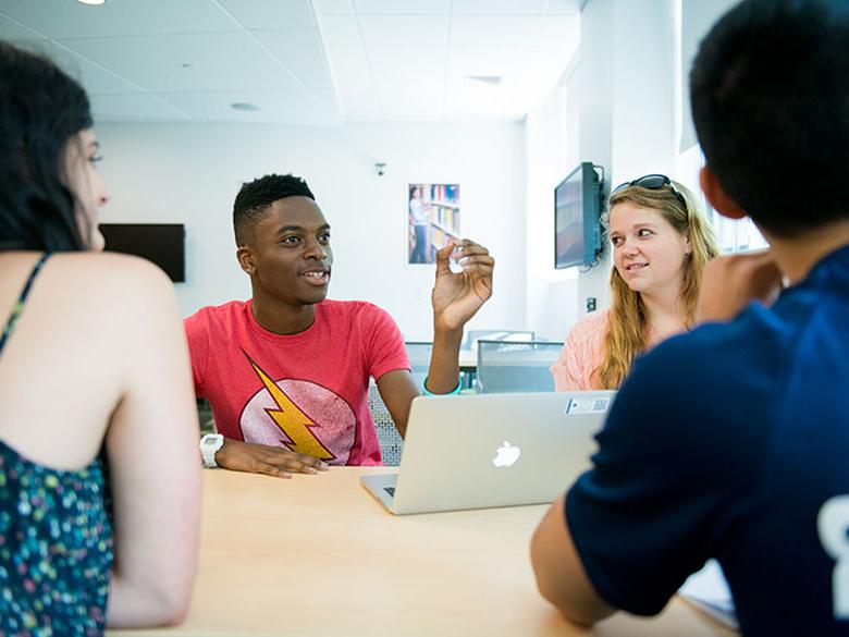 Students working together at table